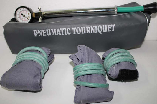 Manual pneumatic tourniquet system with cuff, inflation bulb and pressure gauge